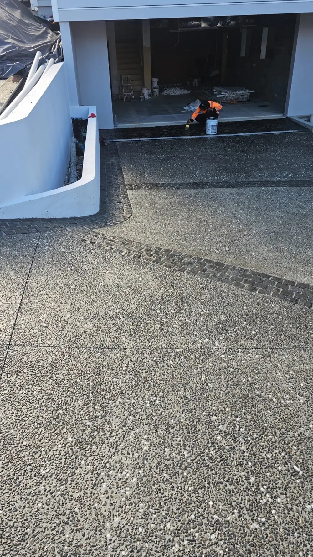 Broom finished concrete road and cul-de-sac on a new subdivision