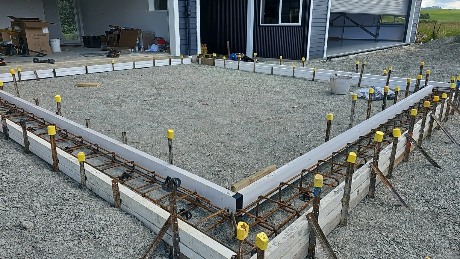 Boxed and reinforced footing prepared before a decorative concrete pour