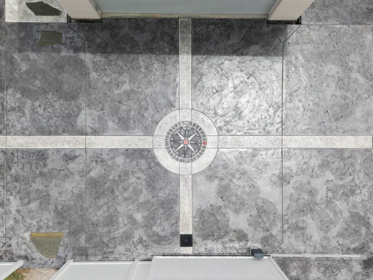 Aerial view of a finished and sealed decorative concrete compass rose centrepiece